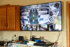 TV screen displaying camera feed footage